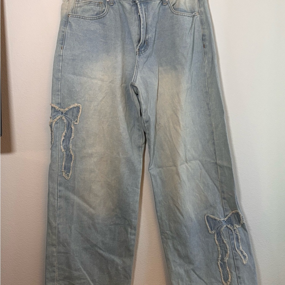 Forever 21 Light Blue Flare Jeans with Bow Accents
